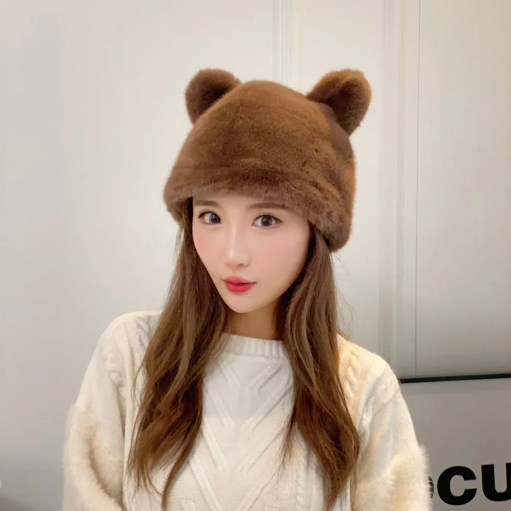Woman wearing a brown fluffy bear ear hat