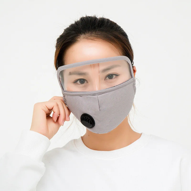 Grey face mask with clear eye shield and breathing valve