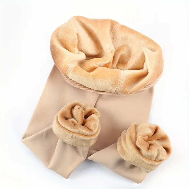 Skin colour footed tights with the waist and feet rolled to show the fleece lining