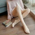 Skin colour fleece-lined footed tights worn with a pink sweater
