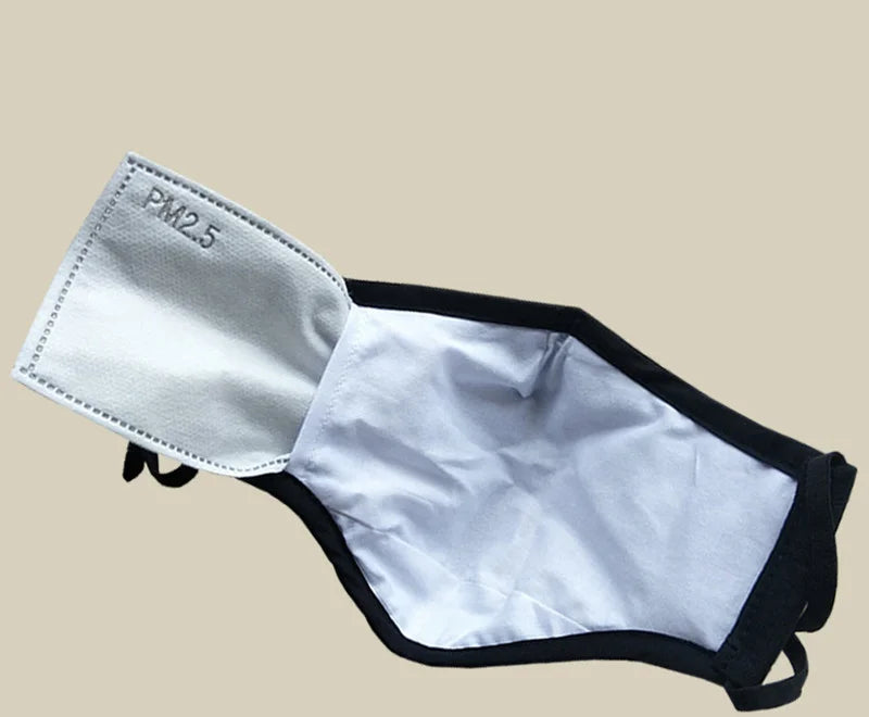 Inside of the cotton face mask showing the pocket for a PM2.5 filter insert