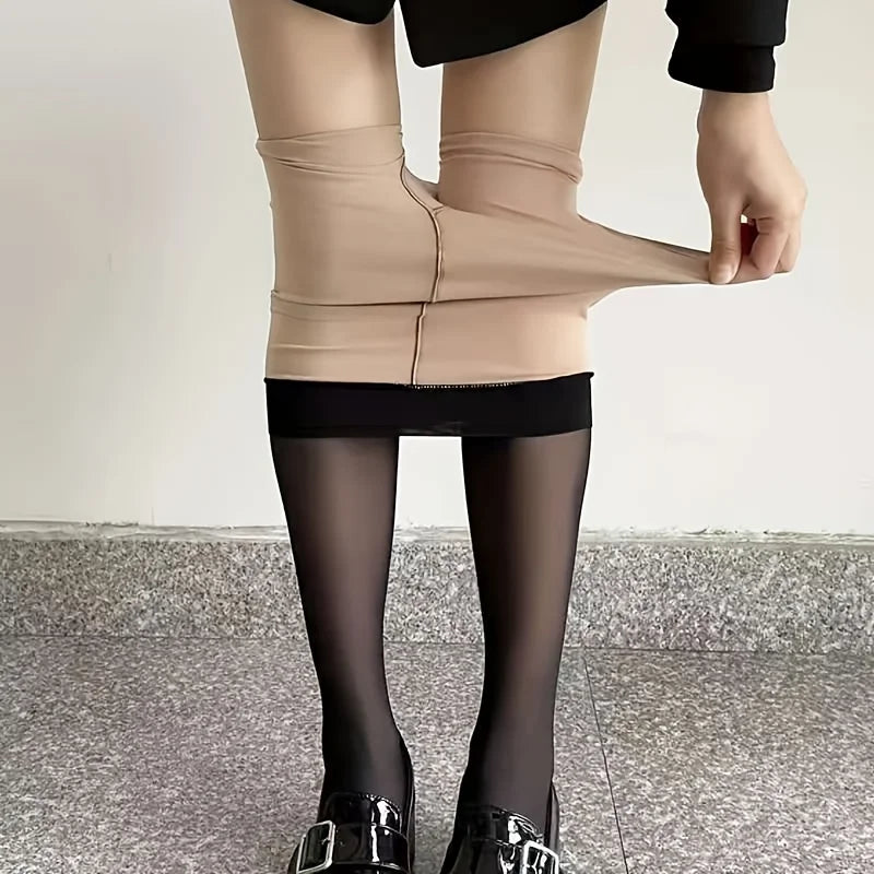 Inside view of the tights: skin-tone inner layer pulled down over the black outer layer