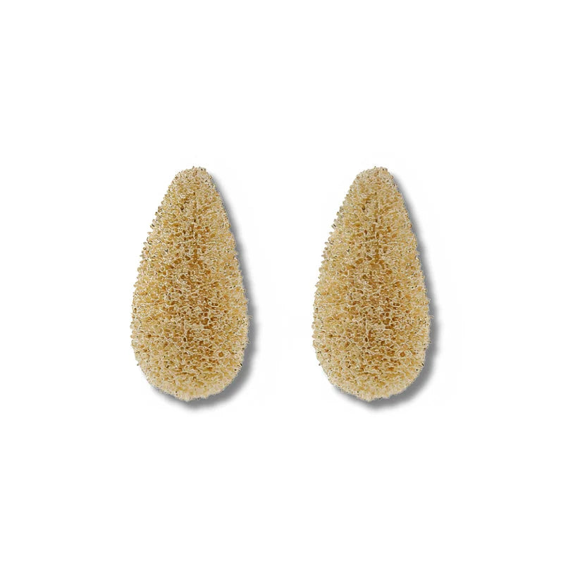 Pair of soft gold textured teardrop stud earrings on a white background