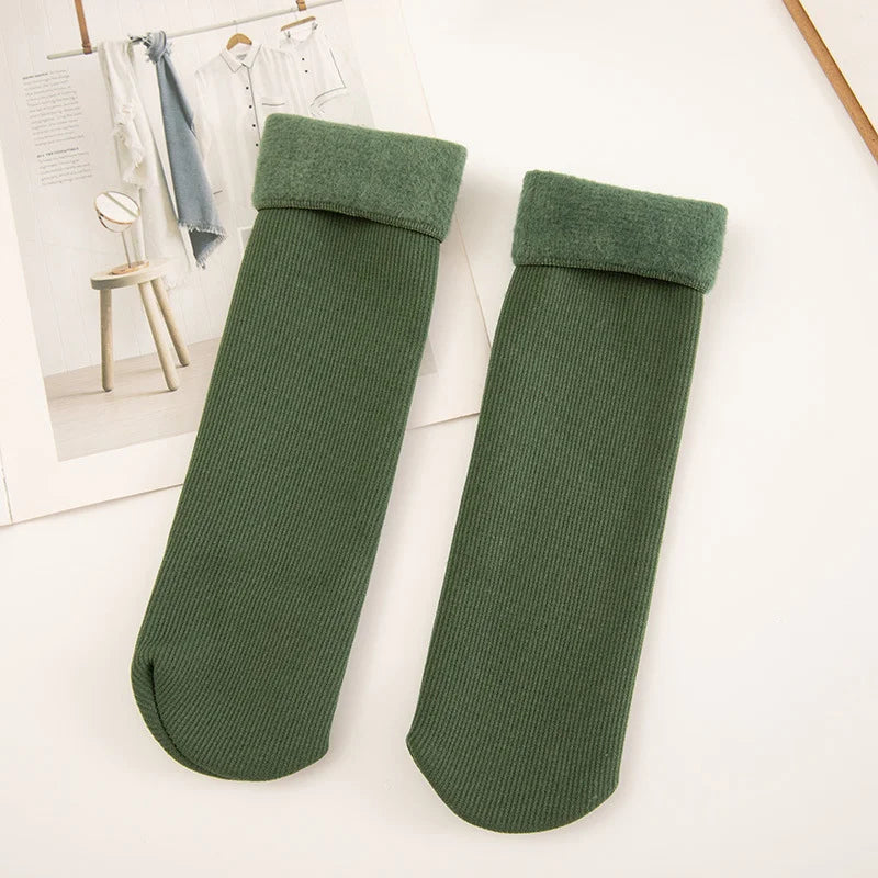 Pair of olive green thick ribbed winter socks with fleece-lined cuffs