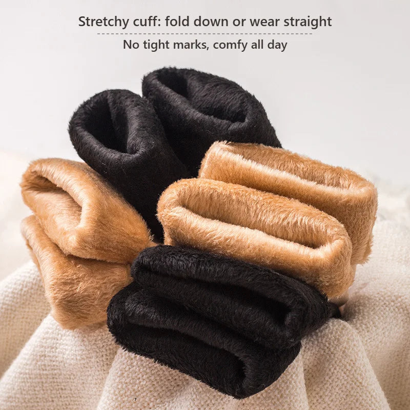 Close-up of thermal socks turned inside out showing plush velvet fleece and stretchy cuffs