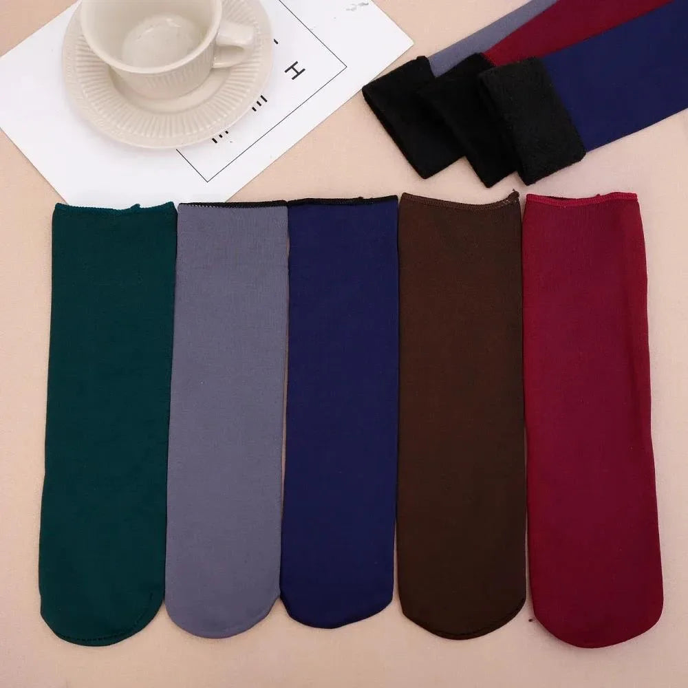 Velvet fleece-lined thermal socks laid flat in green, grey, blue, brown and maroon