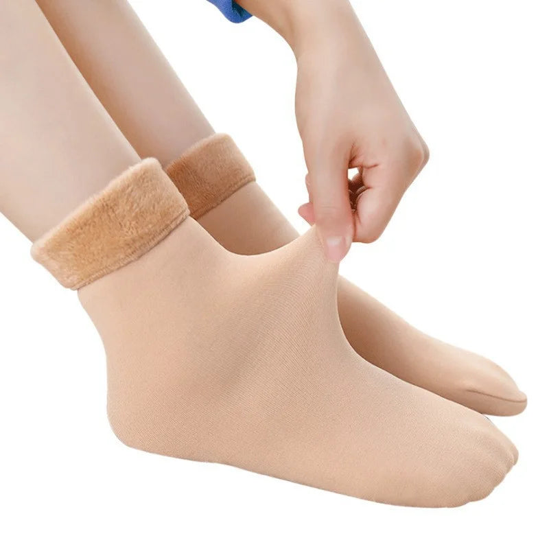 Skin colour velvet thermal socks with the plush fleece cuff folded down