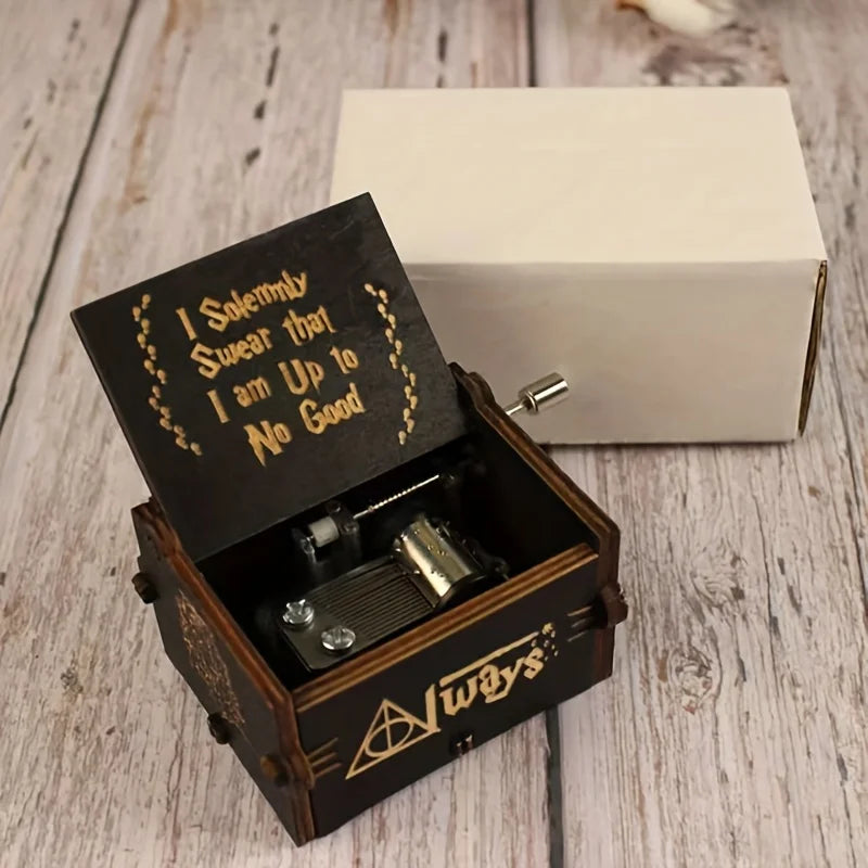 Always wooden music box open to show the metal mechanism, with its white gift box behind